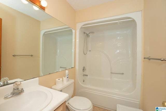 full bathroom featuring a textured ceiling, shower / bathtub combination, vanity, and toilet