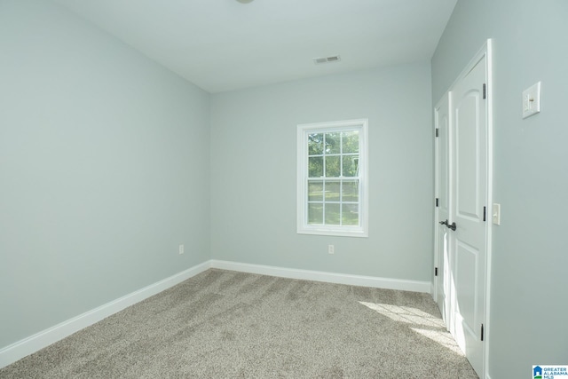 view of carpeted spare room