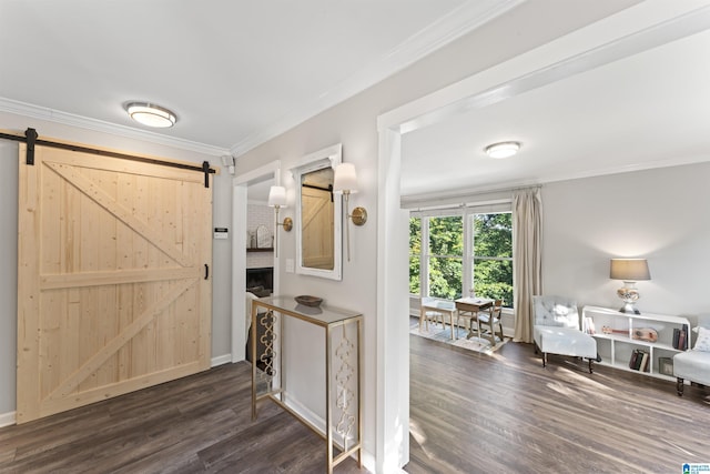 2825 Cahawba Trl, Birmingham, AL 35243 - foyer with ornamental molding, baseboards, a barn door, and dark wood-style floors