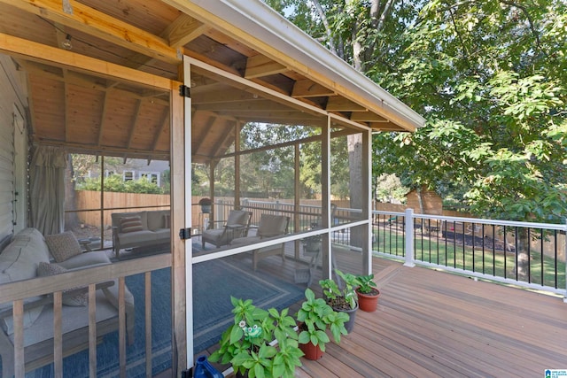 wooden terrace with a sunroom