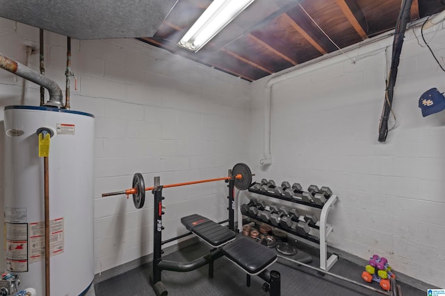 workout room featuring water heater