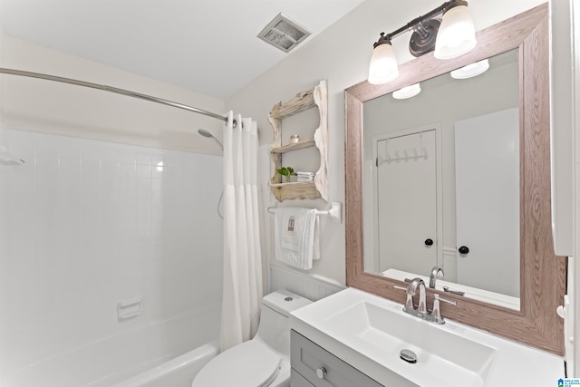 full bathroom with vanity, toilet, and shower / bath combo