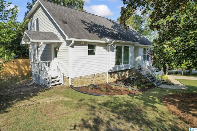 2825 Cahawba Trl, Birmingham, AL 35243 - exterior space with roof with shingles, fence, and a lawn