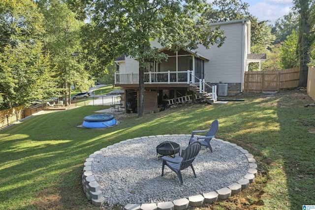 2825 Cahawba Trl, Birmingham, AL 35243 - view of yard with stairway, a fire pit, central AC unit, a fenced backyard, and a sunroom