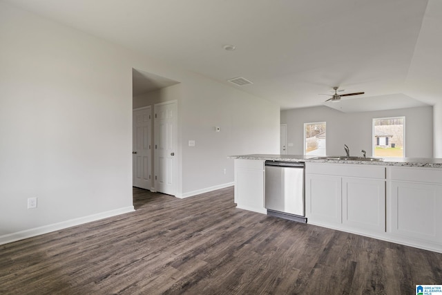 kitchen featuring stainless steel dishwasher, white cabinetry, dark hardwood / wood-style floors, and ceiling fan