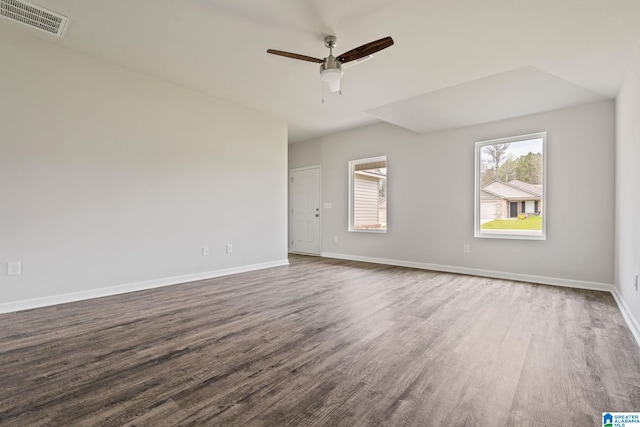 spare room with wood-type flooring and ceiling fan