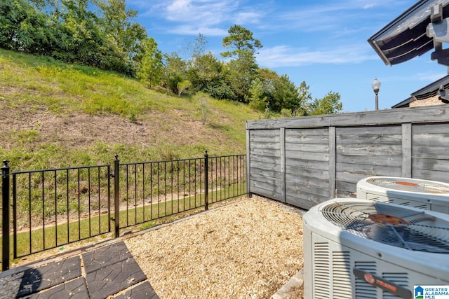 view of yard featuring central air condition unit