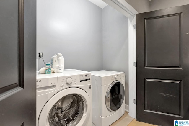 laundry area featuring washing machine and dryer