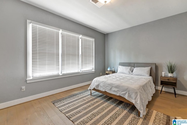 bedroom featuring light hardwood / wood-style floors