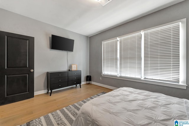 bedroom featuring light wood-type flooring