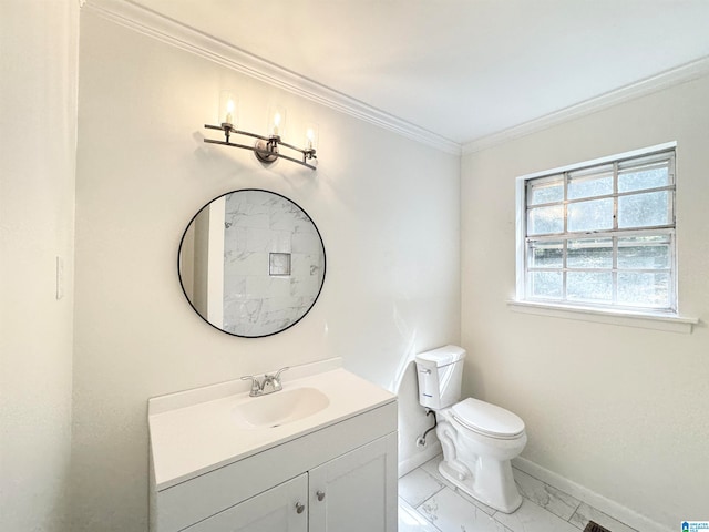 bathroom featuring ornamental molding, vanity, and toilet