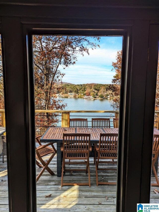 wooden terrace with a water view