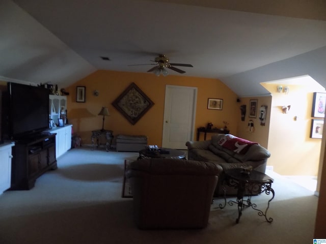 carpeted living room with lofted ceiling and ceiling fan