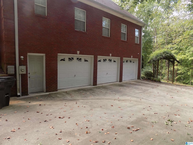 view of property exterior featuring a garage