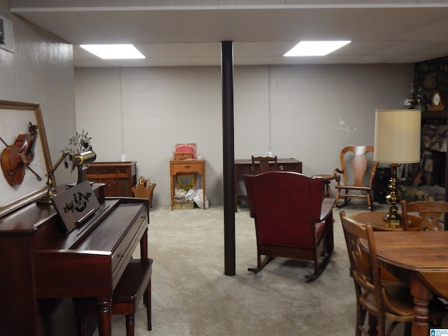 basement with light colored carpet