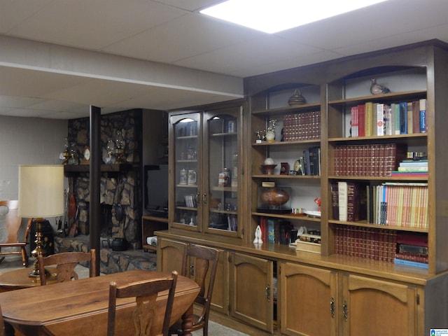 dining room with a paneled ceiling