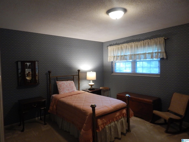 bedroom featuring a textured ceiling