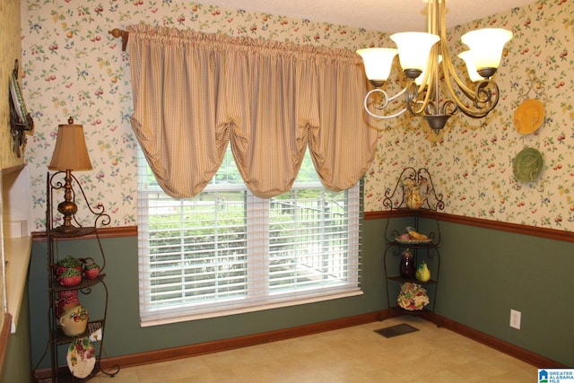 interior space with a chandelier