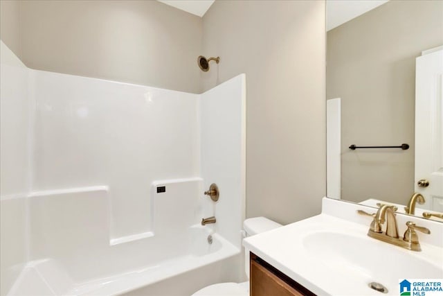 full bathroom featuring shower / tub combination, vanity, and toilet