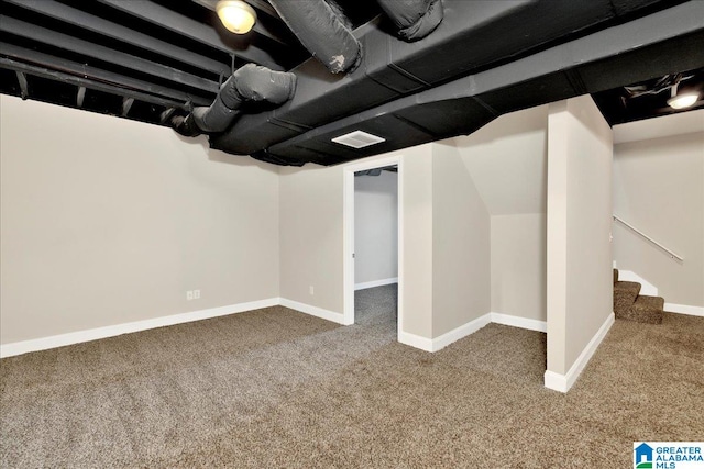 basement with carpet flooring