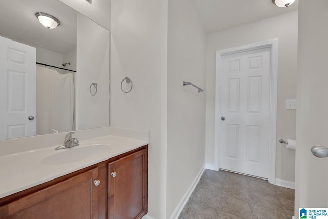 bathroom with vanity and a shower with shower curtain