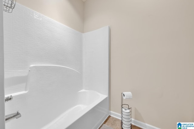 bathroom with shower / bathing tub combination