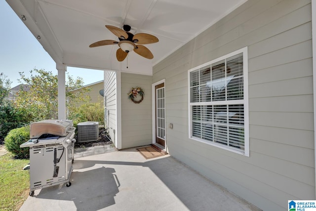 view of patio with central AC unit and ceiling fan