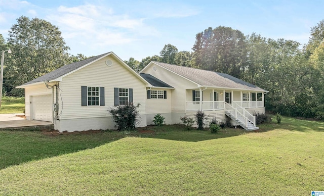 single story home featuring a front lawn, a porch, and a garage