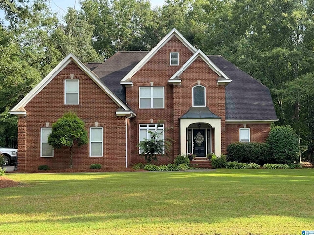 view of front property with a front lawn