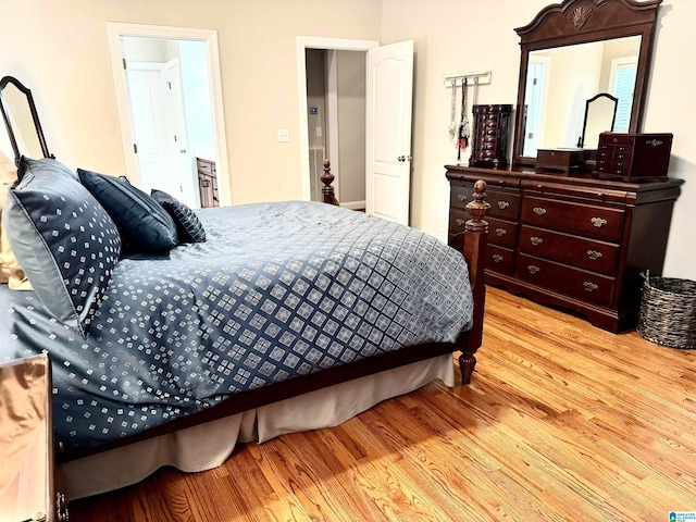 bedroom featuring light wood-type flooring