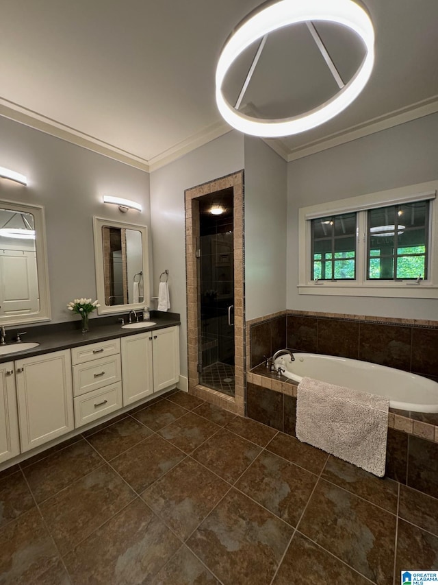 bathroom with vanity, crown molding, tile patterned floors, and plus walk in shower