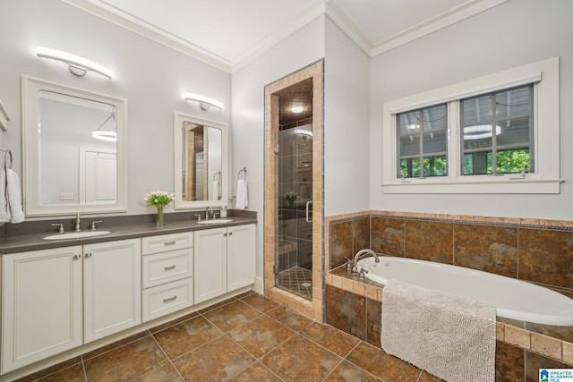 bathroom featuring vanity, crown molding, and shower with separate bathtub