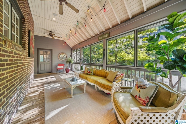 sunroom / solarium with wood ceiling, a wealth of natural light, and vaulted ceiling