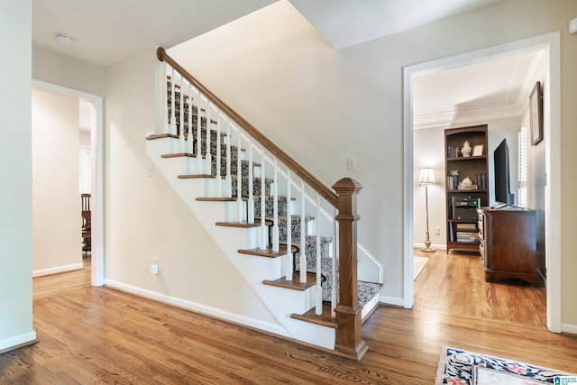 staircase featuring hardwood / wood-style flooring