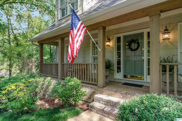 property entrance featuring a porch