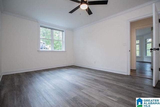 empty room with a ceiling fan, dark wood-style flooring, and ornamental molding