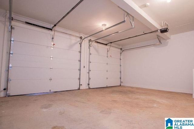 garage featuring a garage door opener