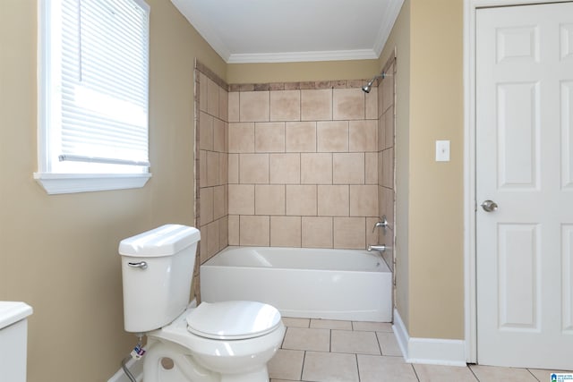 bathroom featuring tiled shower / bath combo, crown molding, toilet, and tile patterned floors