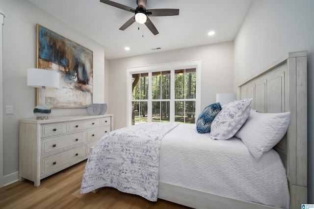 bedroom with recessed lighting, light wood-style floors, visible vents, and ceiling fan