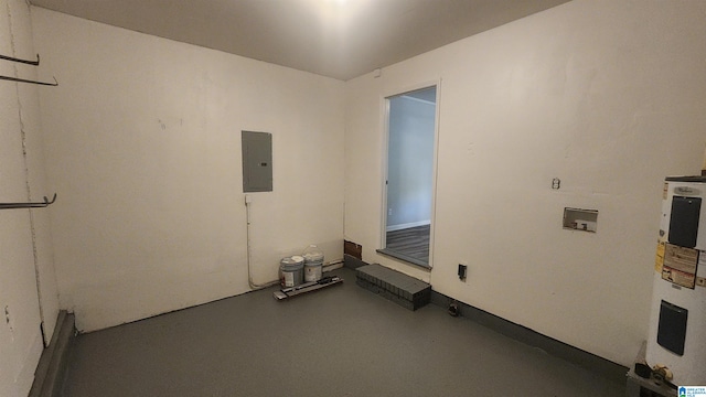 laundry room featuring water heater and electric panel