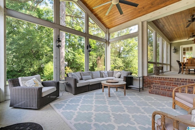 sunroom / solarium featuring ceiling fan and plenty of natural light