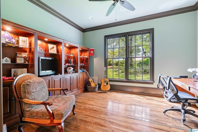 office space with ornamental molding, ceiling fan, and hardwood / wood-style flooring