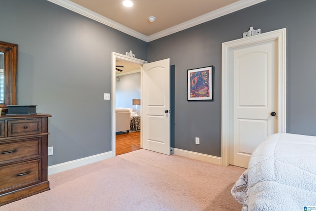 bedroom featuring light carpet and crown molding