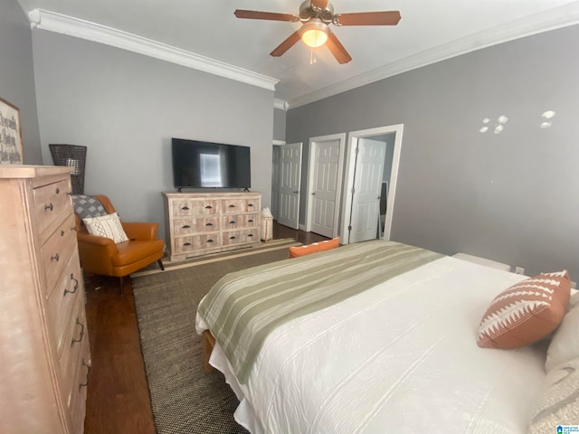 bedroom featuring ceiling fan, dark hardwood / wood-style flooring, and ornamental molding