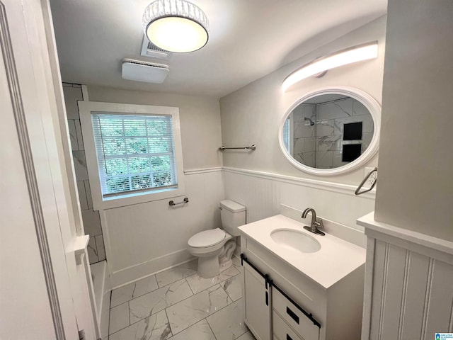 full bathroom with vanity, toilet, and  shower combination