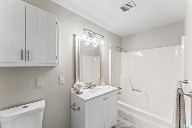 full bathroom featuring shower / bathtub combination, vanity, and toilet