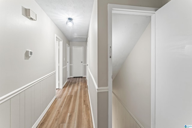 corridor featuring light hardwood / wood-style floors