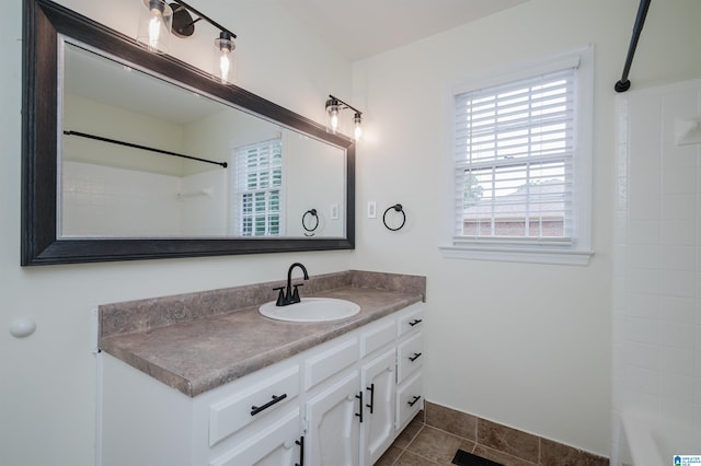 bathroom with shower / tub combination and vanity