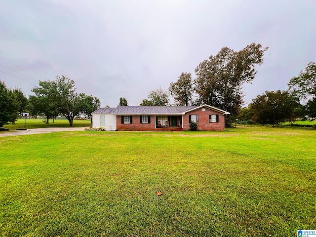 ranch-style house with a front yard