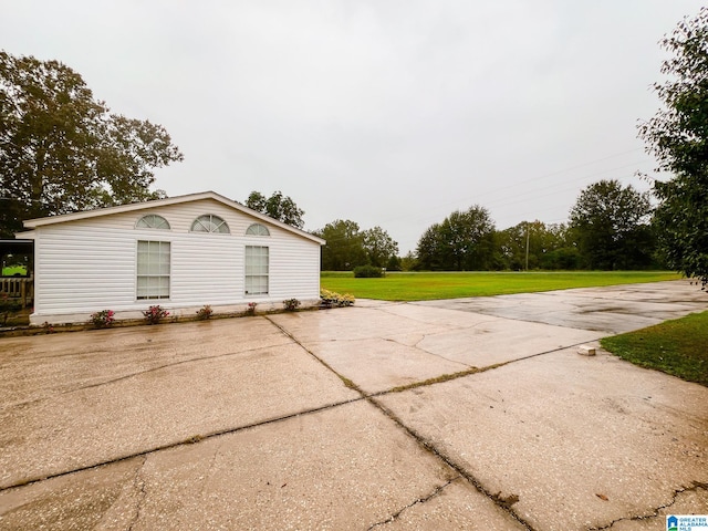 exterior space with a lawn